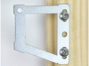 sawtooth picture hanger fitted to a frame