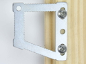 sawtooth picture hanger fitted to a frame